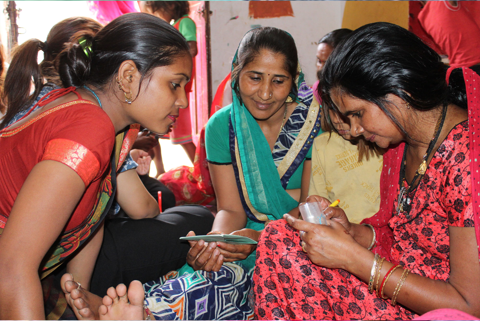 women learning a new skill at a girl empowerment project in Nepal